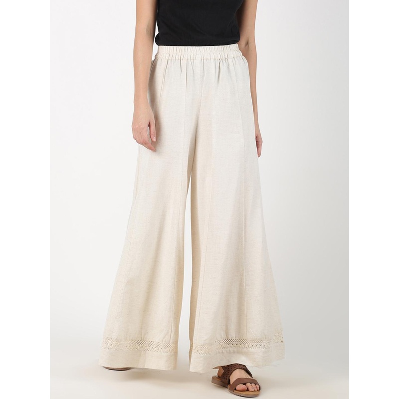 Saffron Threads Women Off-White Solid Flared Palazzos