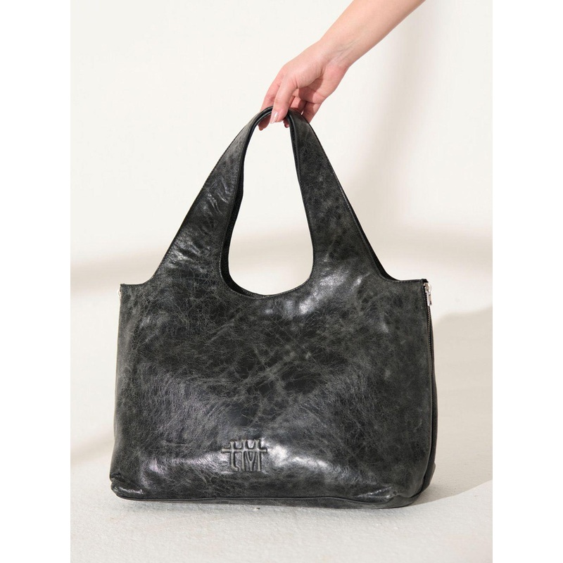 the Misnomer Unisex Textured Leather Oversized Tote Bag