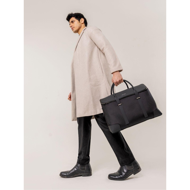 Aethon Unisex Leather Bucket Handheld Bag With Tasselled