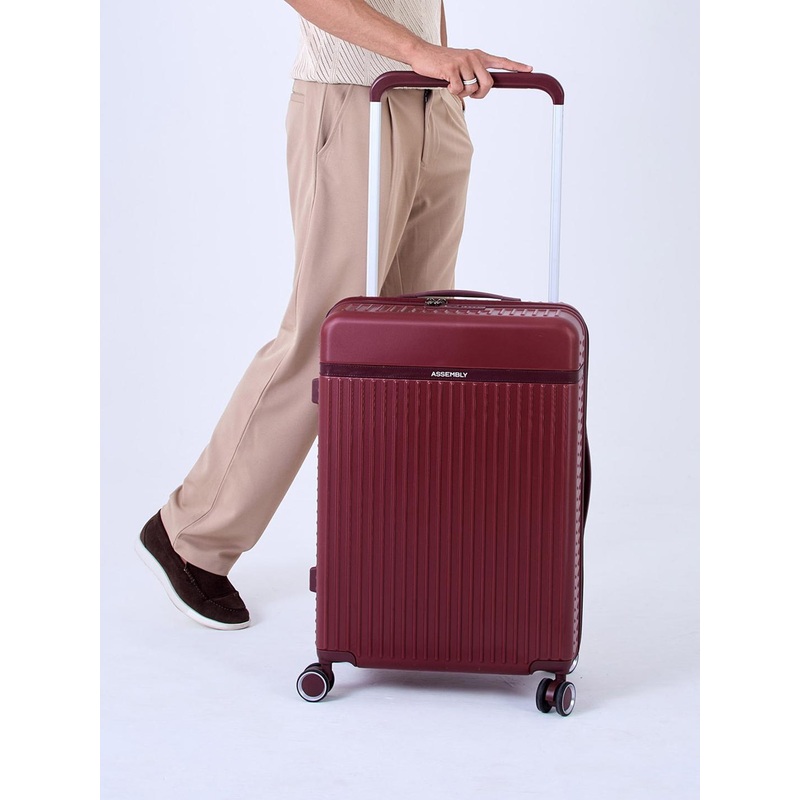 Assembly Premium Polycarbonate Check In Trolley Bag – 24 inch – Red – Rover 65 Litres