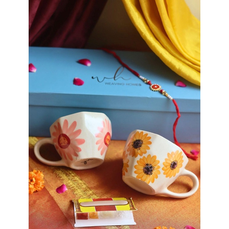 WEAVING HOMES Stone Studded & Beaded Thread Rakhi With Surajmukhi & Flower 2 Mugs